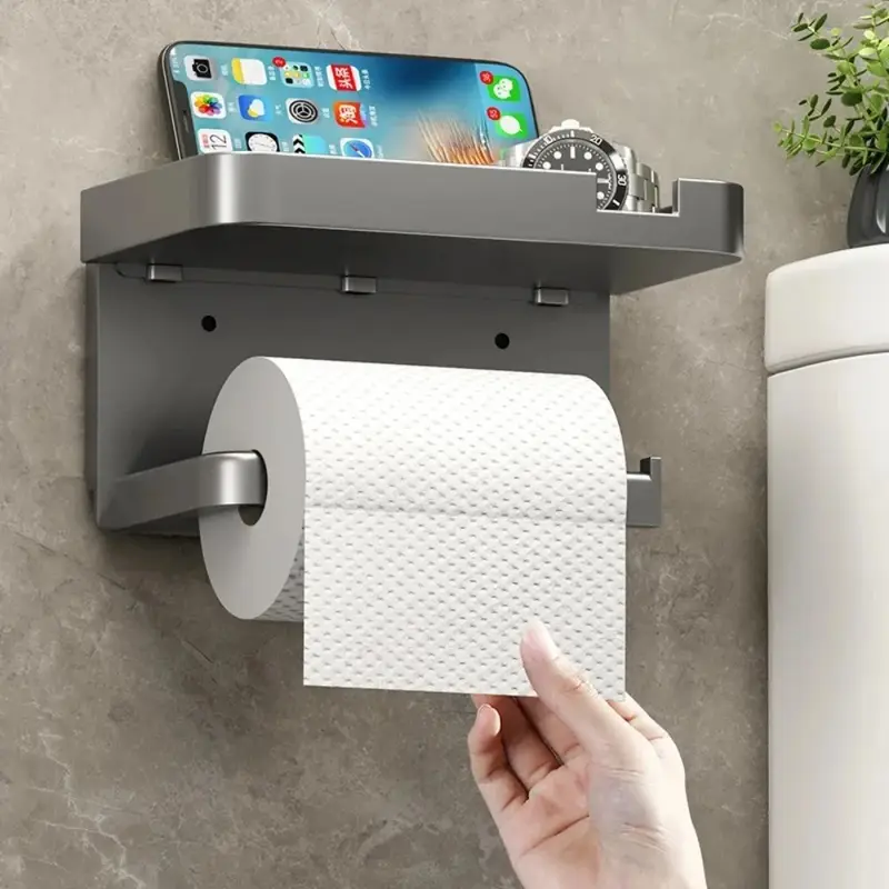 Wall-mounted toilet paper holder with a shelf on top