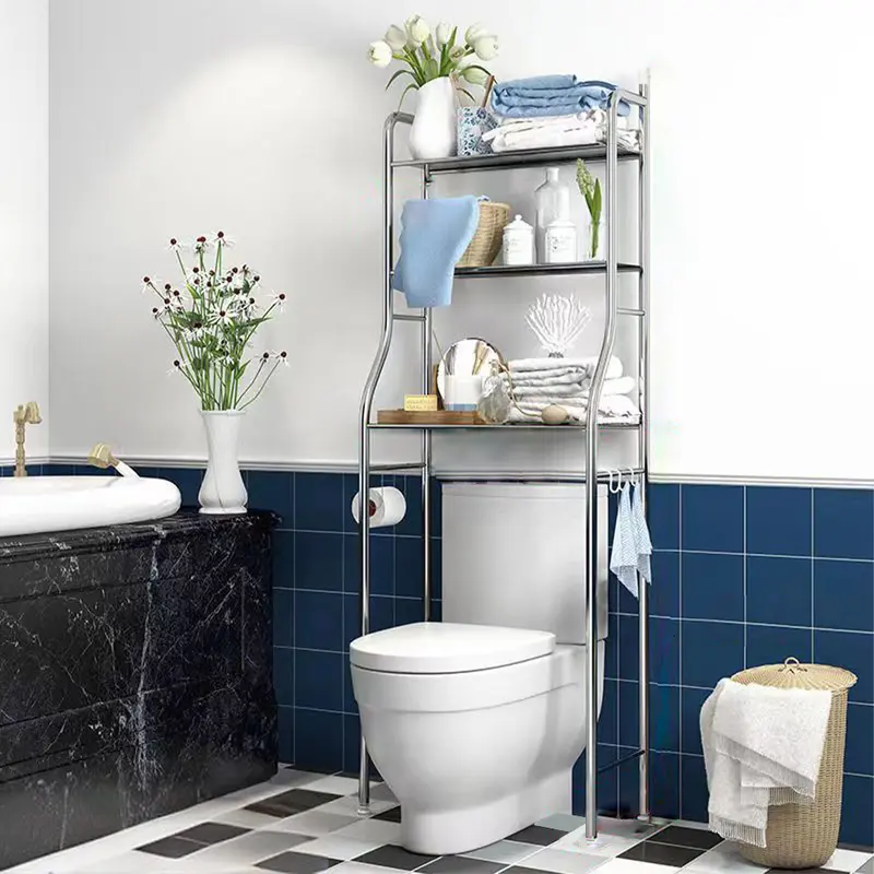Three-tier stainless steel shelf standing over a toilet