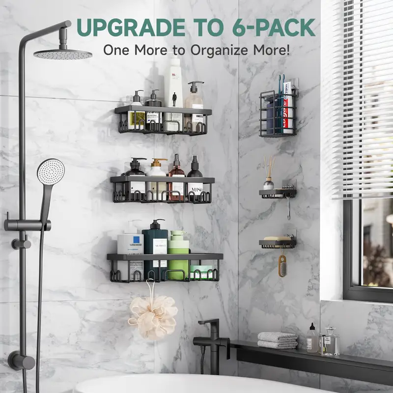 Gold stainless steel adhesive shower shelves on a bathroom wall