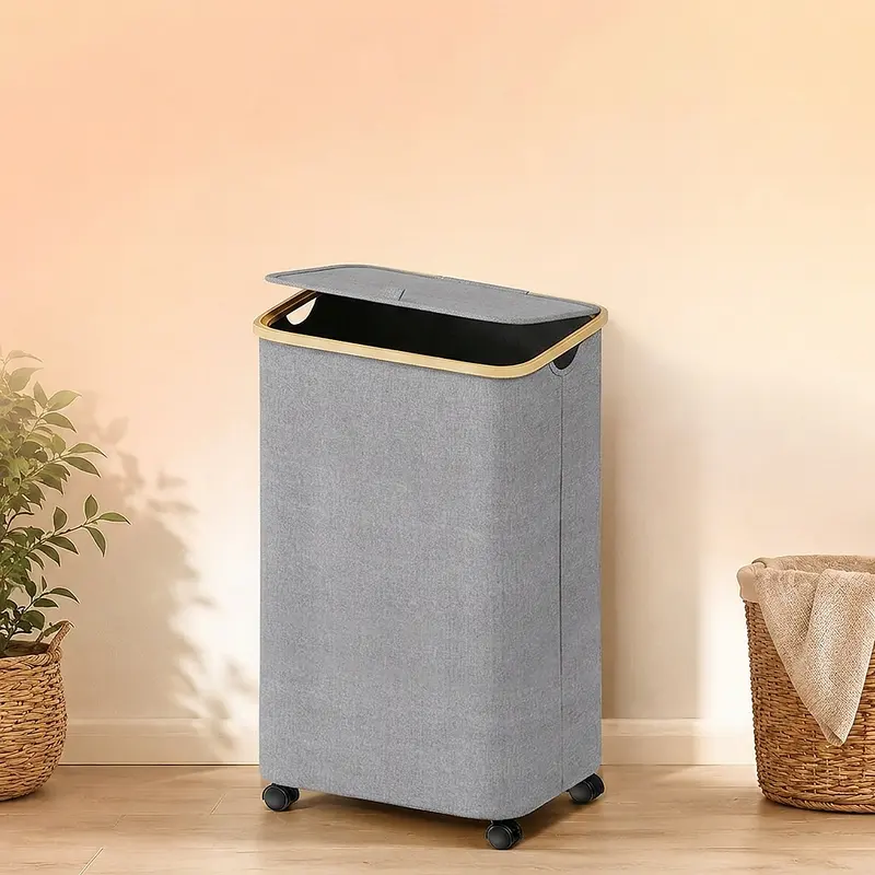 Slim rolling laundry hamper with a lid beside a washing machine