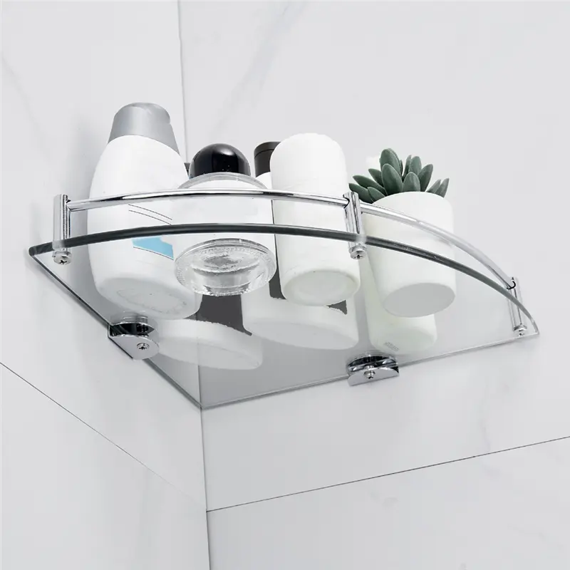 Clear triangle glass corner shelf on a bathroom wall