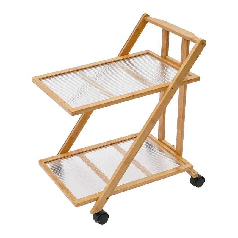 Two-tier folding bamboo cart with books beside a sofa