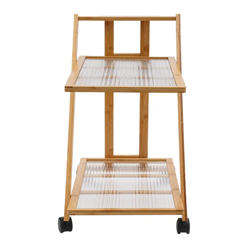 Two-tier folding bamboo cart with books beside a sofa