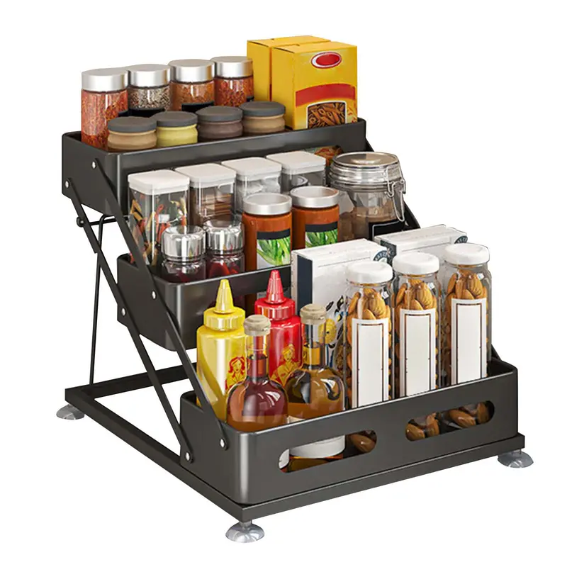 Black three-tier spice rack filled with seasoning bottles
