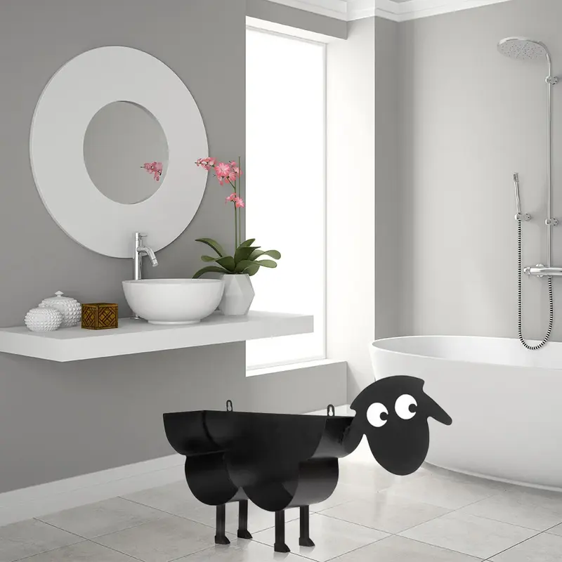 Black metal sheep-shaped toilet paper holder