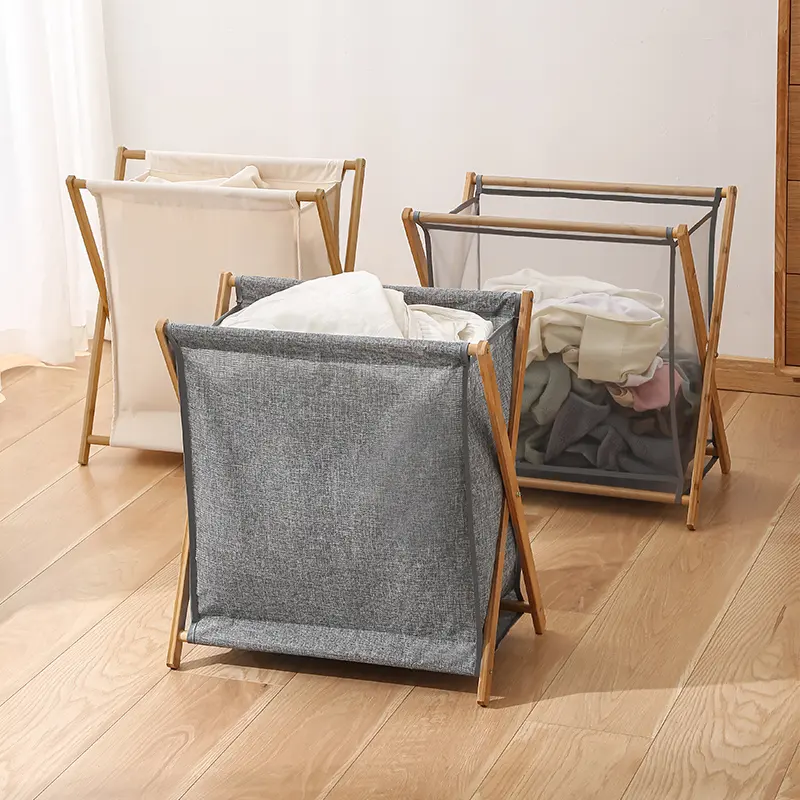 Foldable bamboo laundry hamper with a fabric bag