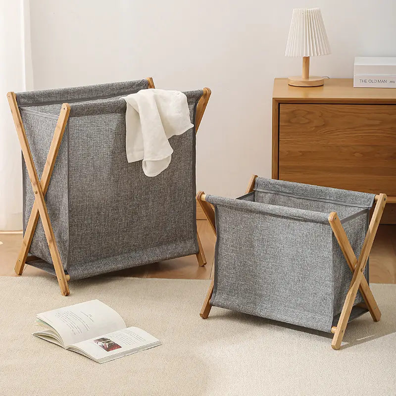 Foldable bamboo laundry hamper with a fabric bag