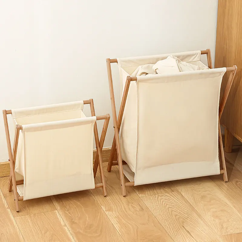 Foldable bamboo laundry hamper with a fabric bag