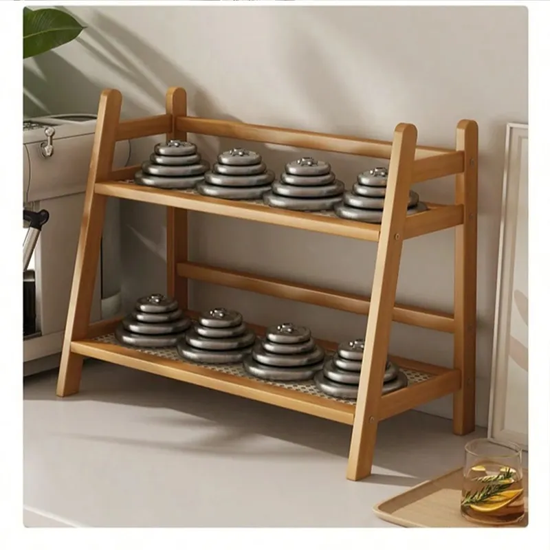 Two-tier bamboo rack with a woven rattan shelf on a counter