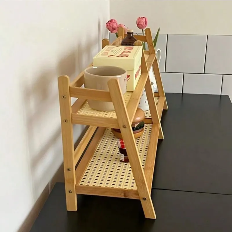 Two-tier bamboo rack with a woven rattan shelf on a counter