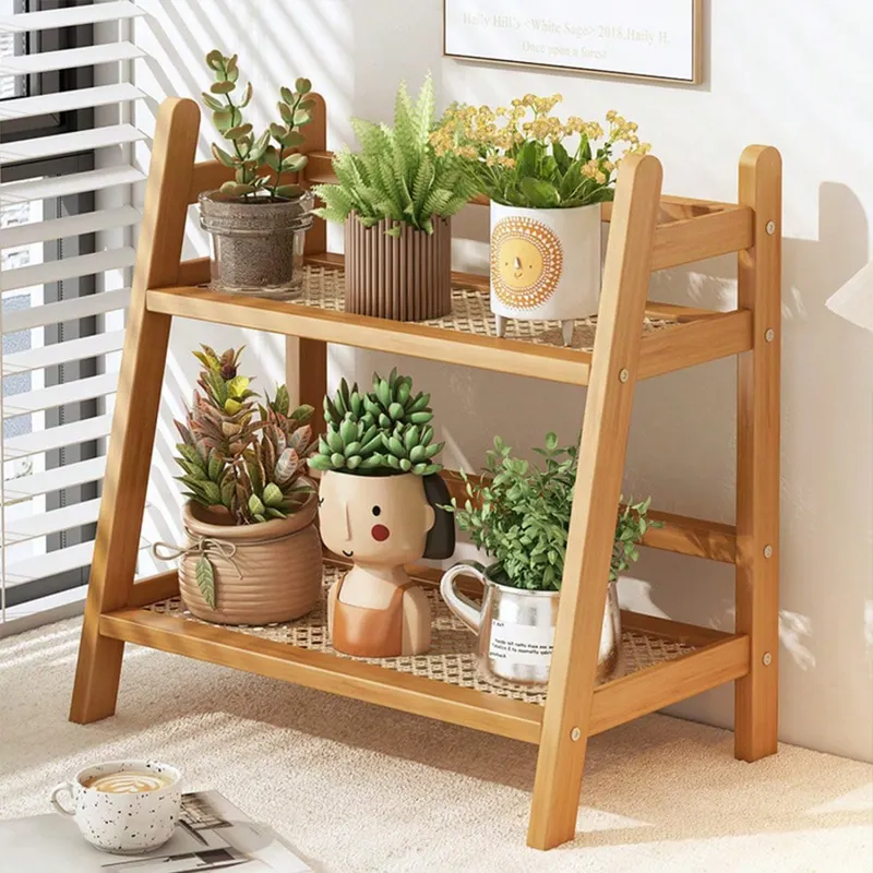 Two-tier bamboo rack with a woven rattan shelf on a counter