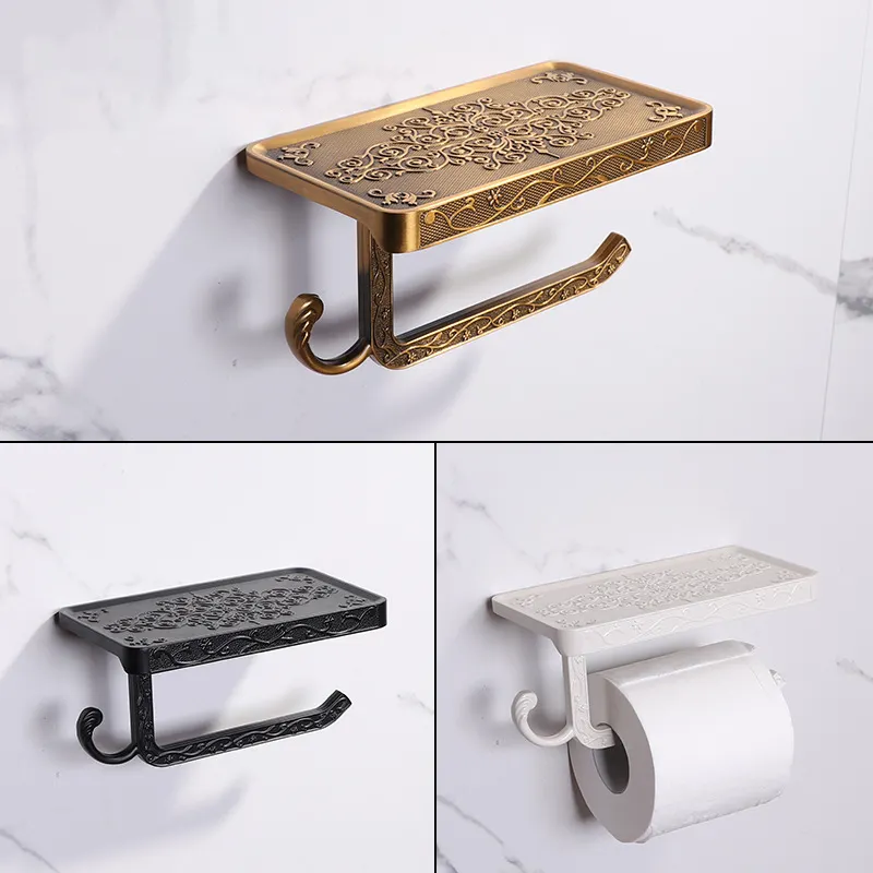 Antique bronze carved toilet paper holder with a phone shelf