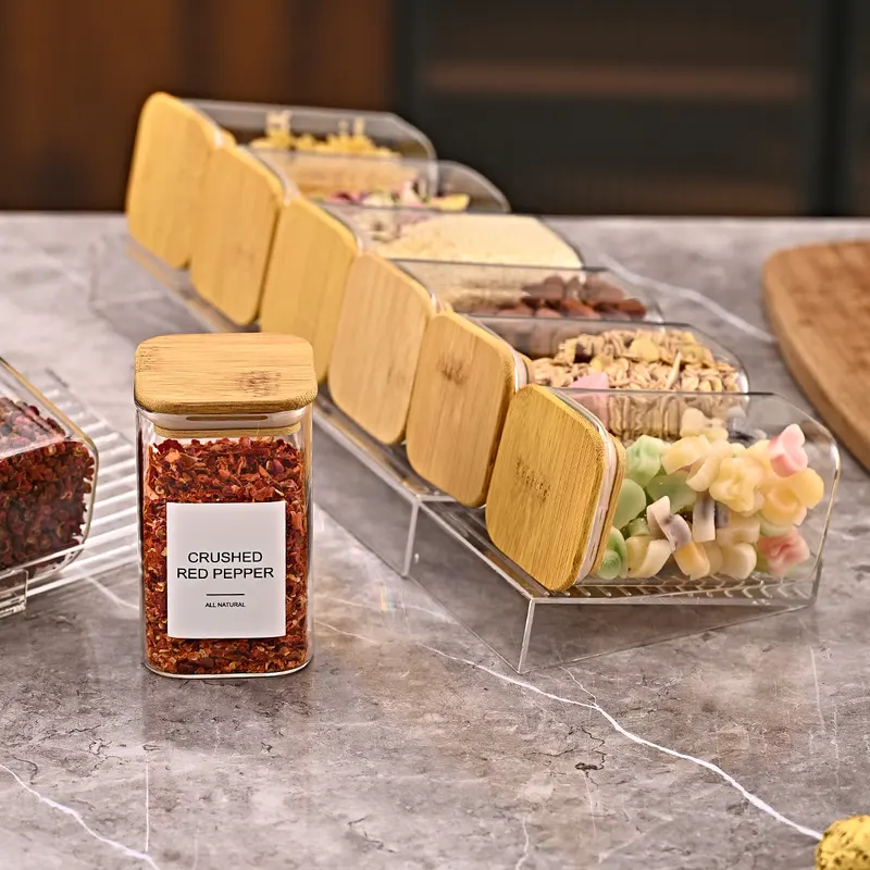 Clear adjustable spice drawer insert in a kitchen drawer