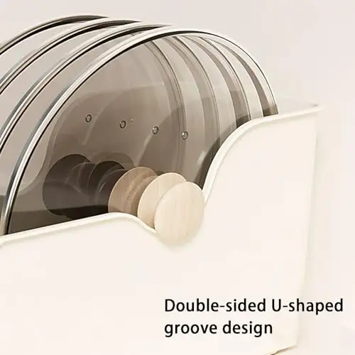 Beige plastic pull-out bins on wheels in an under-sink cabinet