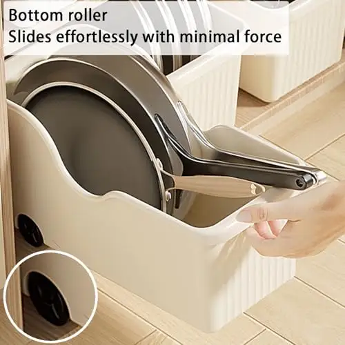 Beige plastic pull-out bins on wheels in an under-sink cabinet