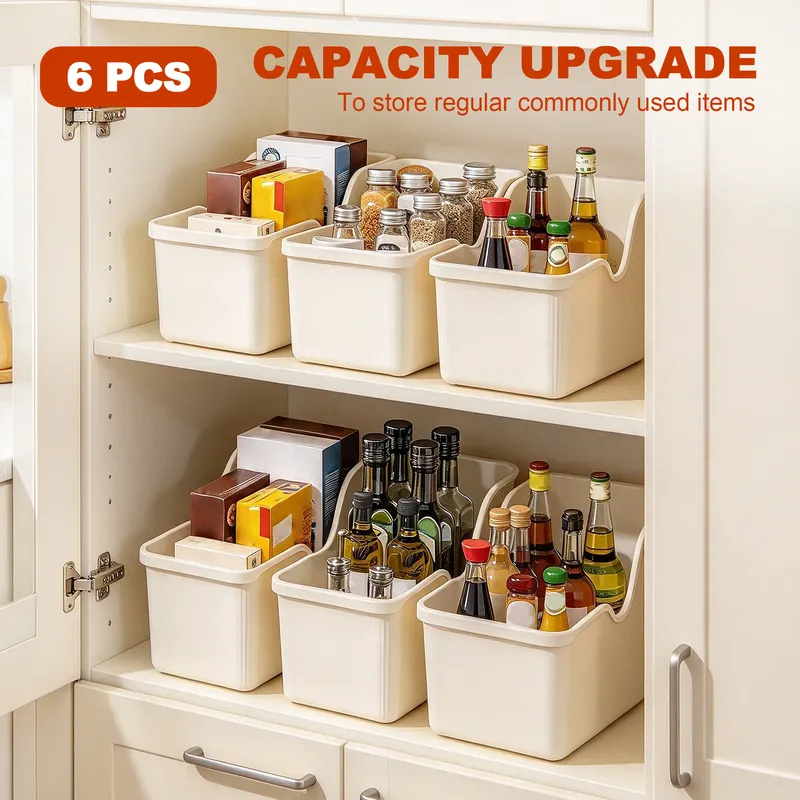 Plastic organizer bins with wheels on a kitchen shelf