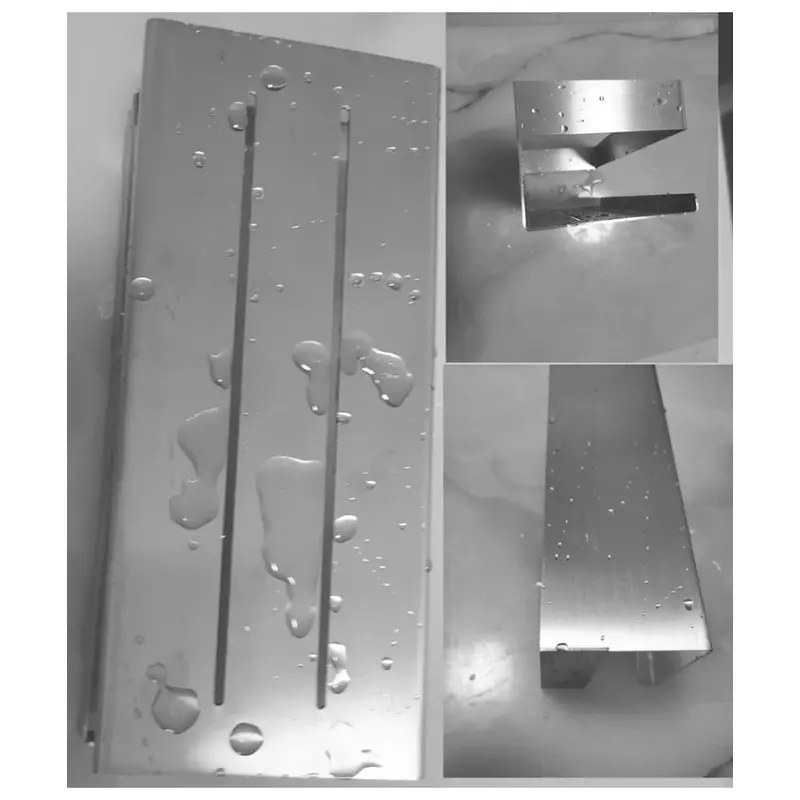 Silver stainless steel shower basket with hooks on a wall