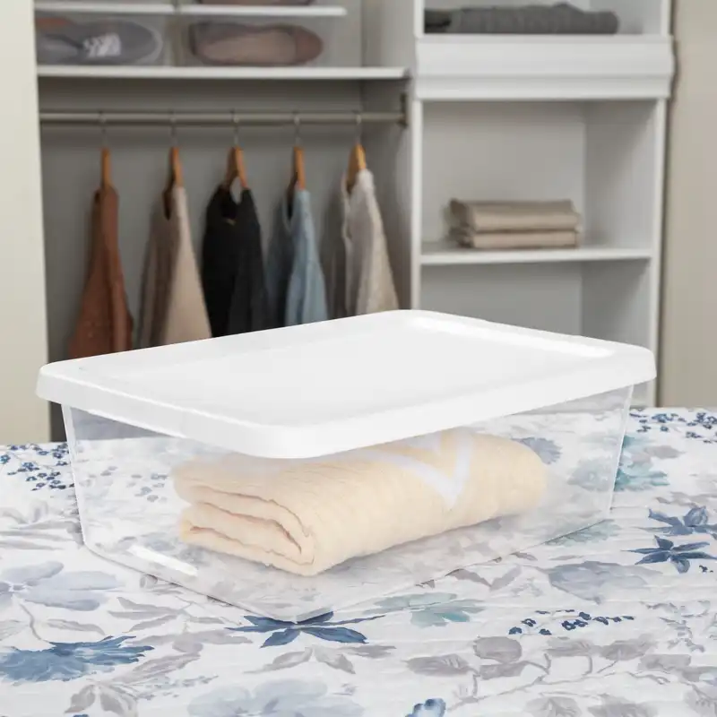 Three clear plastic storage bins with white snap-on lids