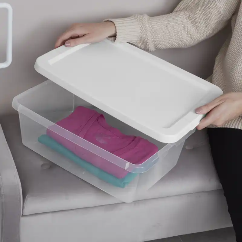 Three clear plastic storage bins with white snap-on lids