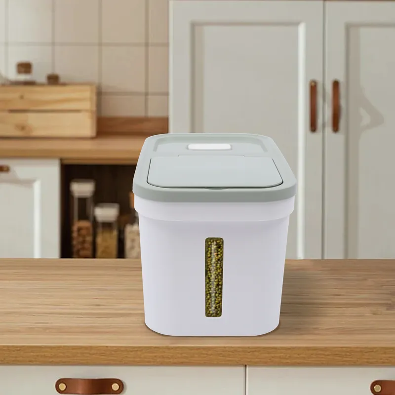 Rectangular rice storage container with a flap lid on a kitchen counter