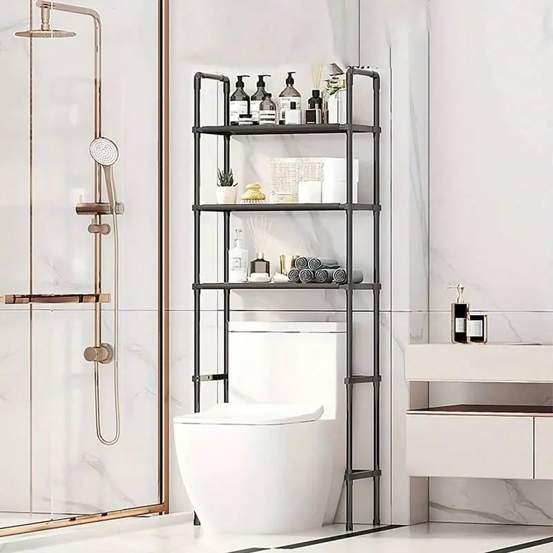 Black multilayer storage rack standing over a toilet