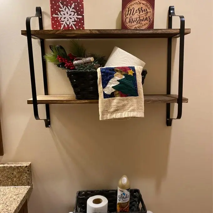Two-tier pine wall shelf with black metal brackets