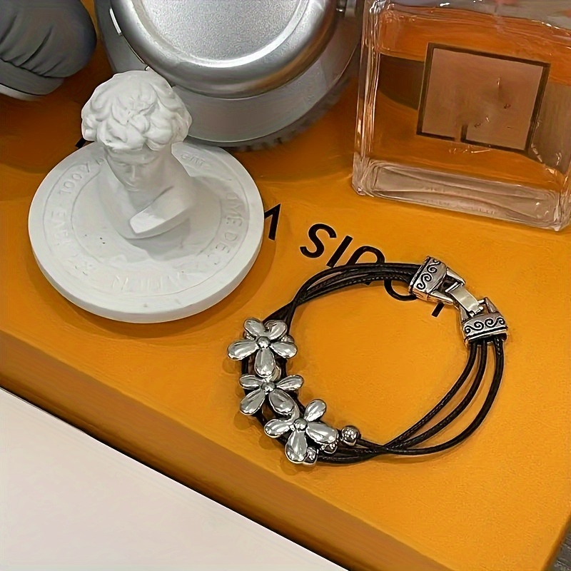 chic bohemian inspired bracelet with petite floral decor faux leather rope design multi layer vintage charm ideal for holidays and gift giving details 4