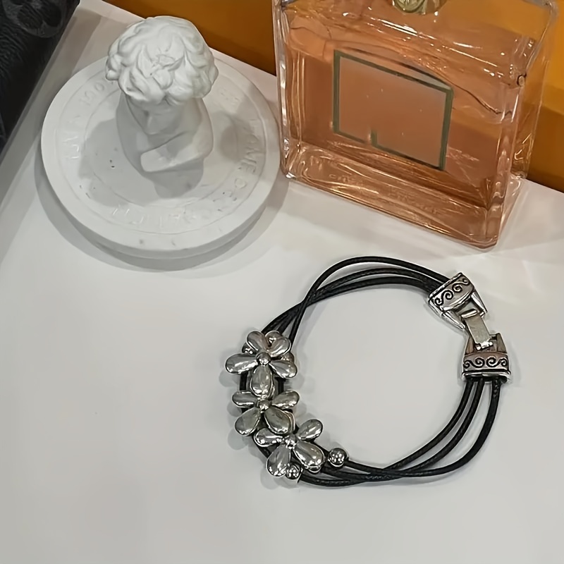 chic bohemian inspired bracelet with petite floral decor faux leather rope design multi layer vintage charm ideal for holidays and gift giving details 5